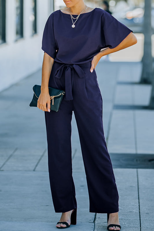 Blauer, glamouröser Jumpsuit mit weitem Bein und Gürtel