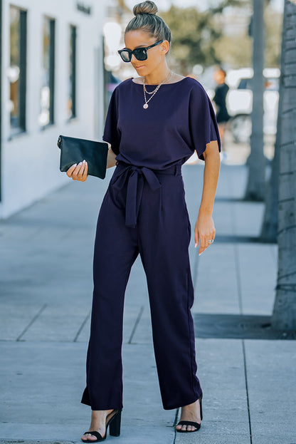 Blauer, glamouröser Jumpsuit mit weitem Bein und Gürtel