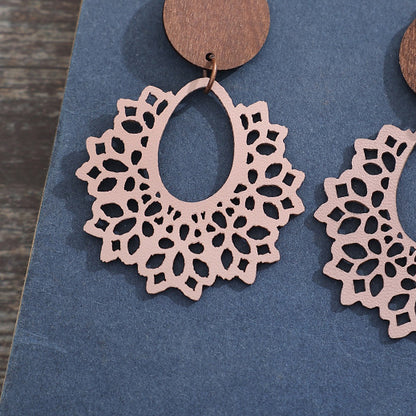 Boucles d'oreilles pendantes à découpes géométriques