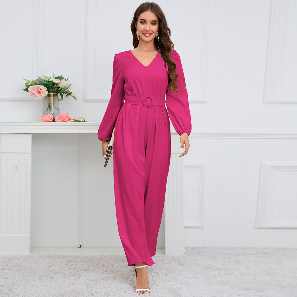 Lässiger, einfarbiger Jumpsuit mit V-Ausschnitt, langen Ärmeln, schmaler, gerader Beinschnitt, Gürtel