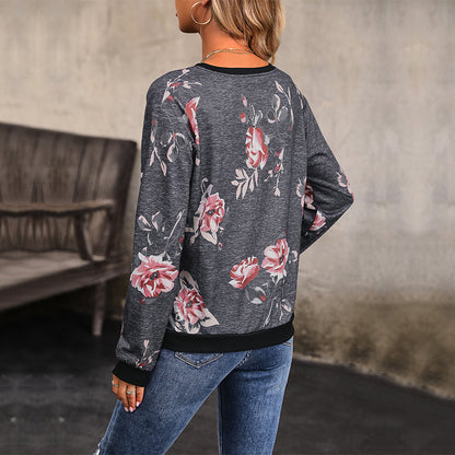 Herbst Damen tragen langärmliges bedrucktes Sweatshirt mit Rundhalsausschnitt